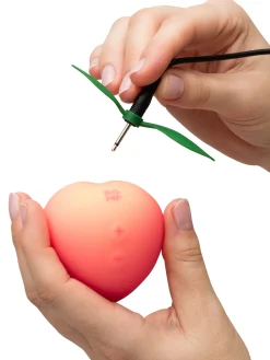Romp Peach Clitoral Vibrator